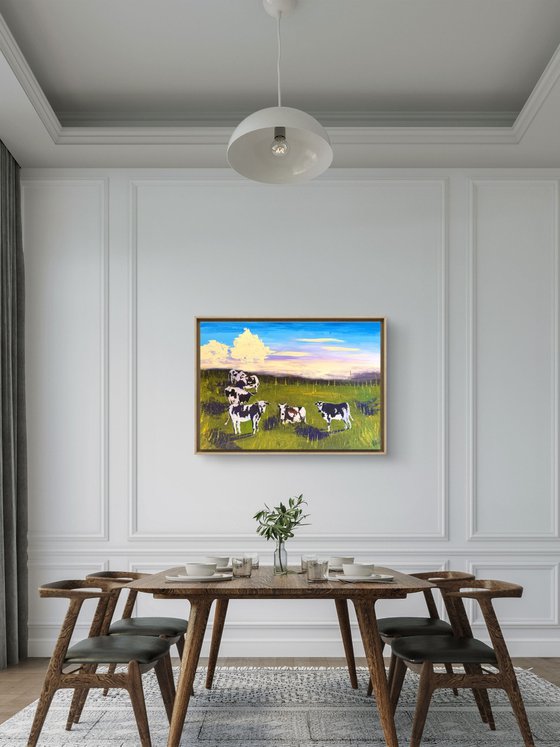 Cows grazing in the field