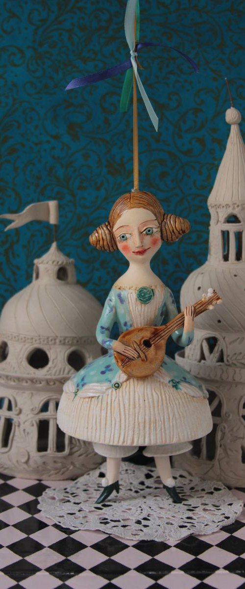 Girl with a mandoli. Ceramic hanging sculpture by Elya Yalonetski