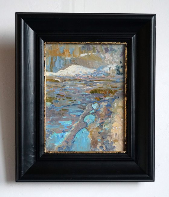 The last snow. Puddles. Pereslavl-Zalessky