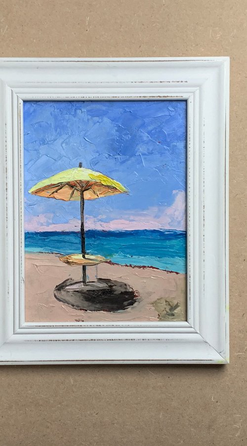 Yellow parasol on the Beach. by Vita Schagen