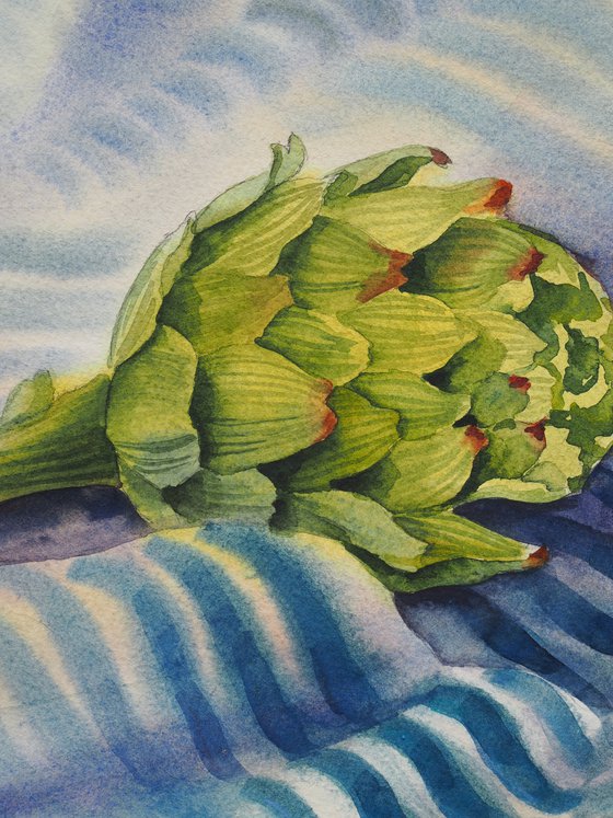 Turkish still life with tea and artichoke on a striped towel