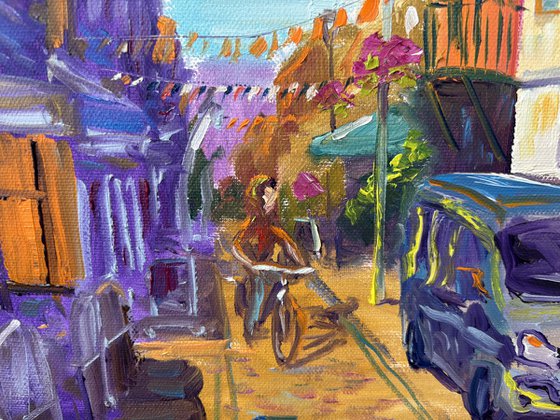 Festive Dutch town scene with cyclist