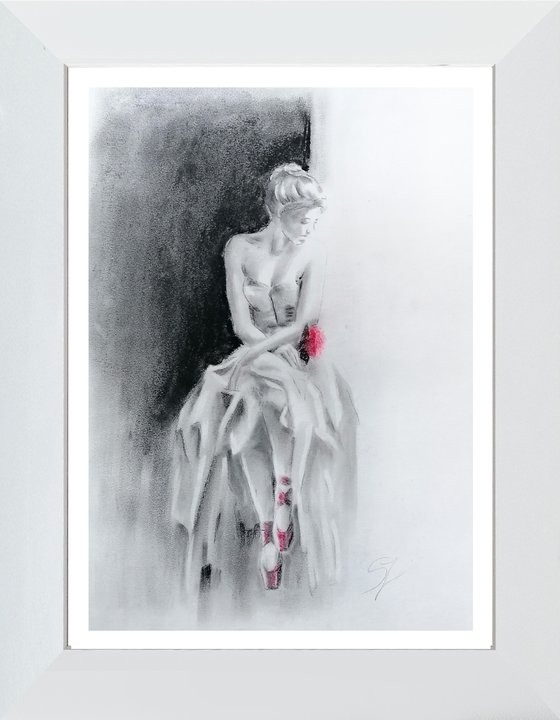 Ballerina with a red rose