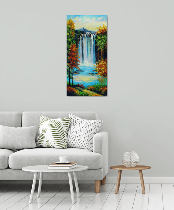 Mountain waterfall by the lake