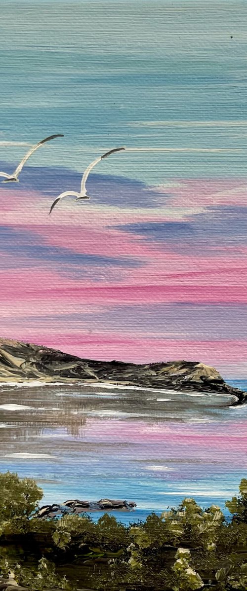 Lulworth Cove Under a Pink Sky by Marja Brown