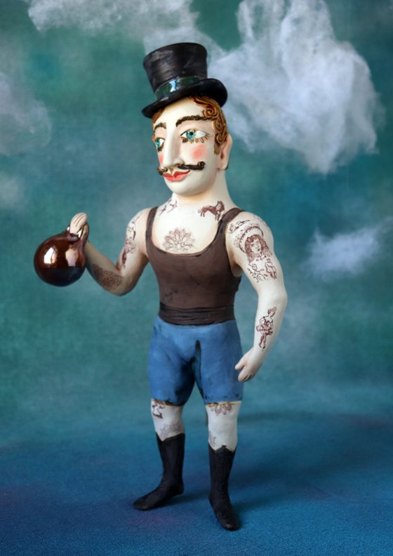 Vintage Strongman with zylinder hut. Wall sculpture by Elya Yalonetski.