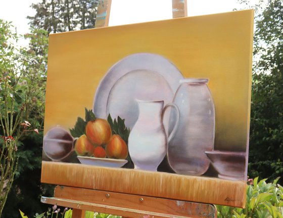 Still life with fruits and kitchen utensils