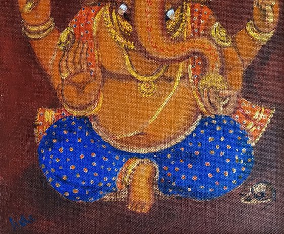 Lord Ganesh with blue eyes