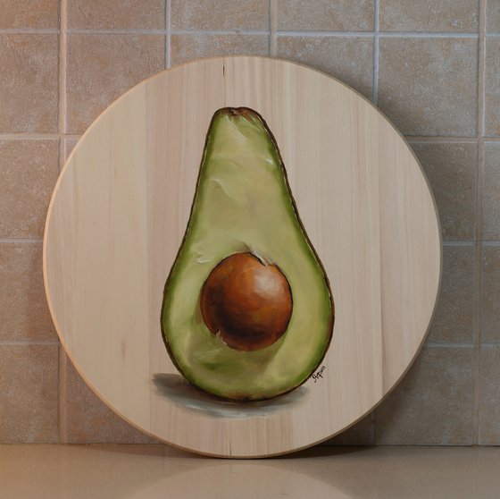 Rotating round wooden tray with avocado