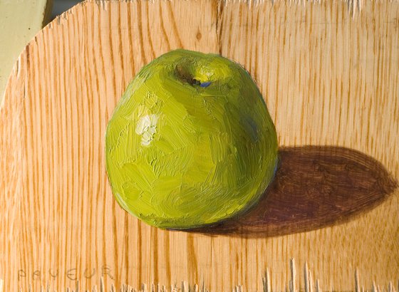 lonely apple on a wood board for food lovers