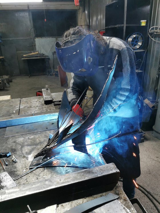 Unique welded iron sculpture beautiful space effects unique style by Romanian master O KLOSKA