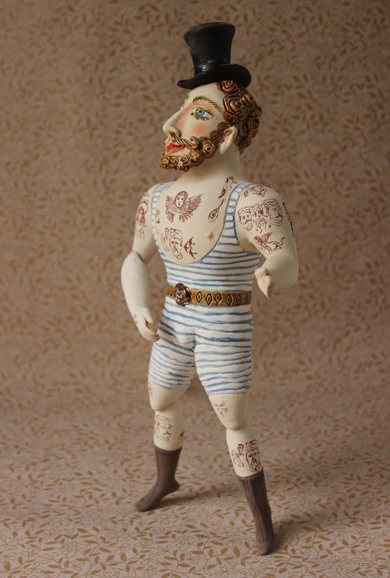 Circus athlete with hipster beard. Wall sculpture by Elya Yalonetski.