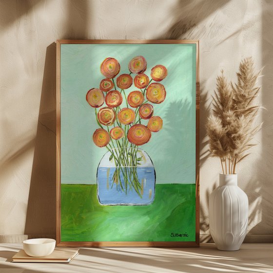 Vase with red orange flowers