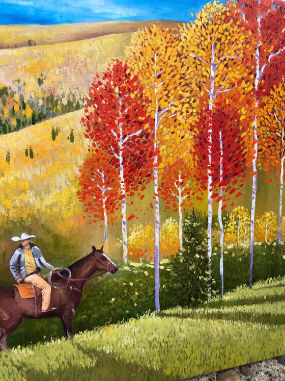 Cowboy in autumn forest