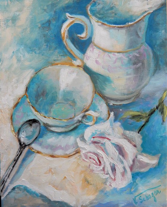 Teacup, white rose, milk jug .Still life.