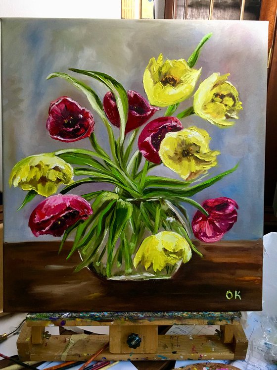 Bouquet of Red and Yellow tulips on wooden  table, still life. .