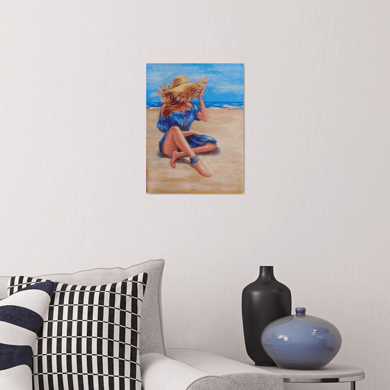 Woman in hat on beach