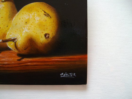 Three pears in chiaroscuro