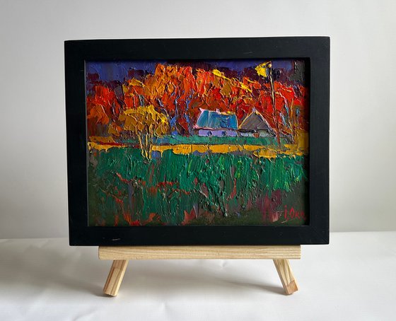 Crimson autumn in the village