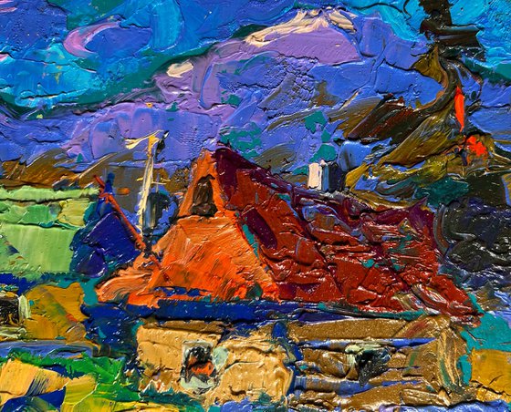 Village and blue mountains