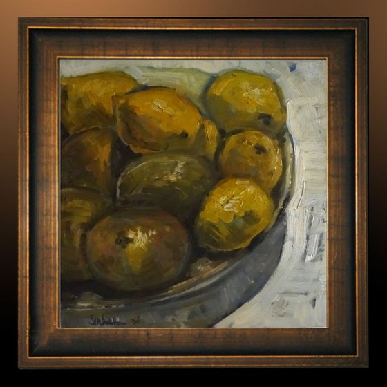 still life with lemons and some onions