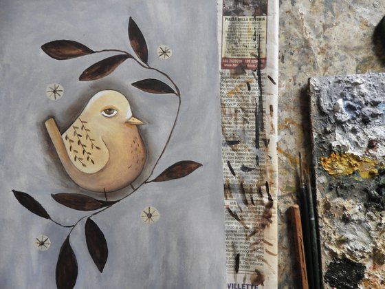 The bird between the leaves