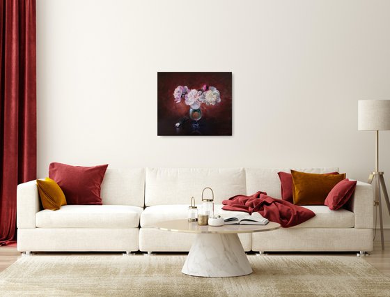 Peonies bouquet in a glass vase