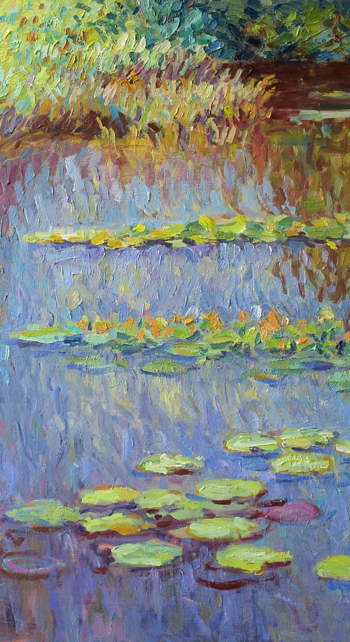 Water lilies with tree reflections by Liudvikas Daugirdas