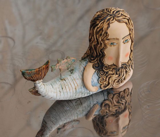 Merman, the sea leon. Ceramic ooak sculpture.