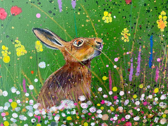 Hares in the meadow. Acrylic painting