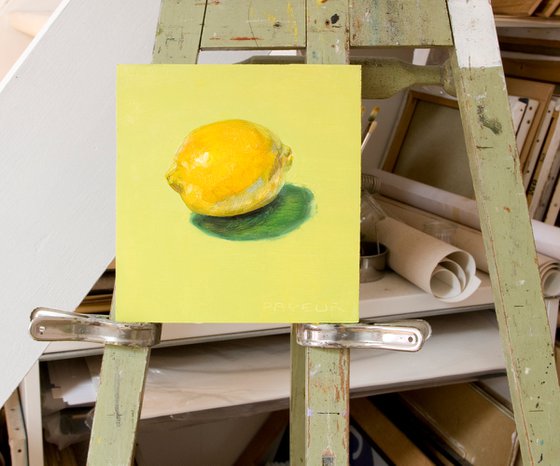 gift for food lovers: modern still life of yellow lemon on green