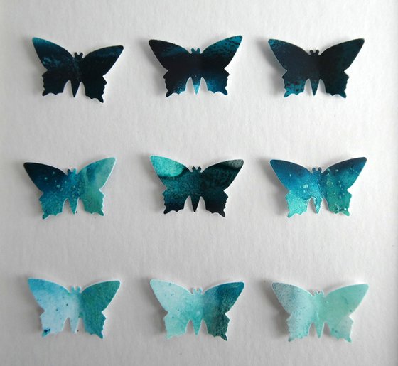 9 Emerald butterflies