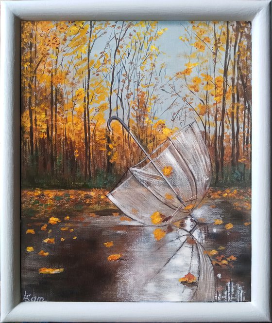 A forgotten umbrella in autumn