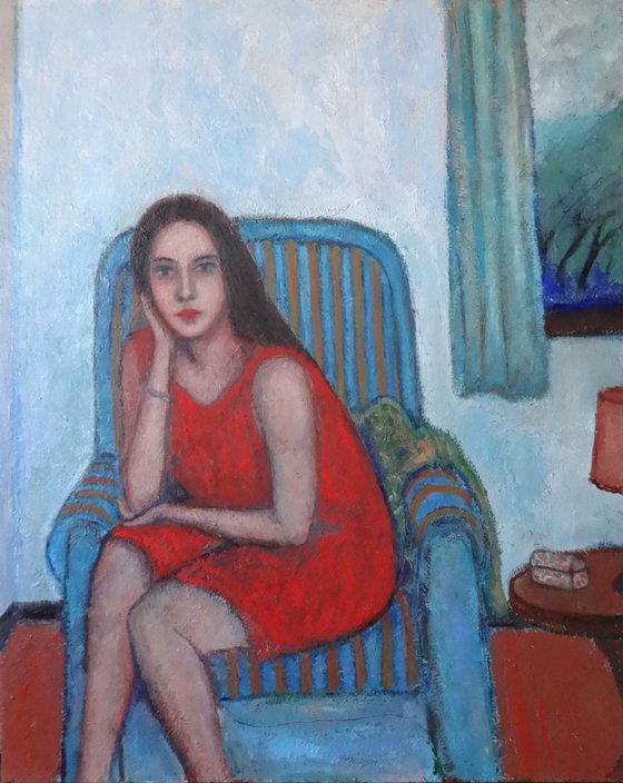 Woman on armchair with a storm outside