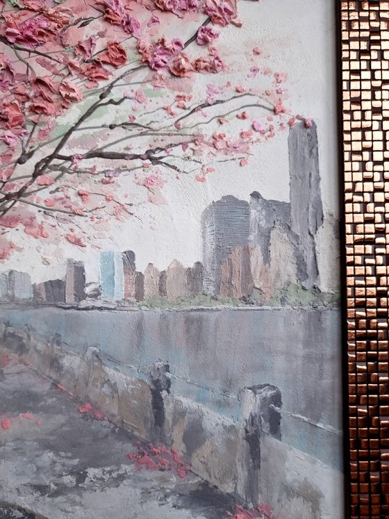 Cherry blossoms. Spring in New York. Roosevelt Island, Manhattan. Pink relief flowers.