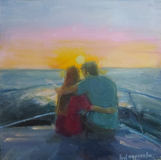 Lovers enjoy the sunset