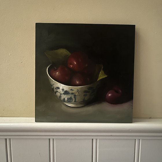 plums in a china bowl