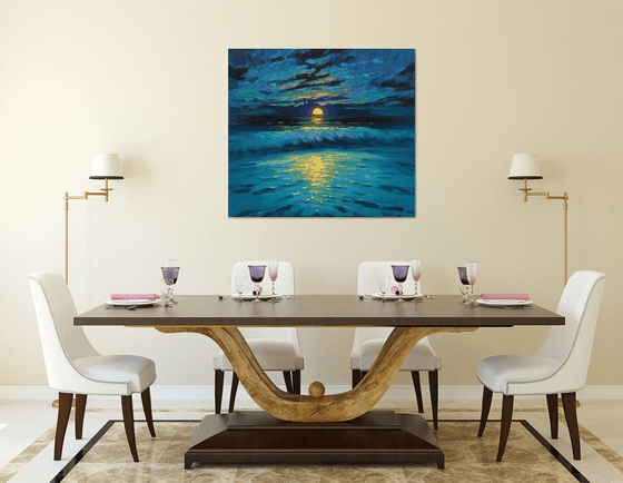 Moonrise in blue over sea