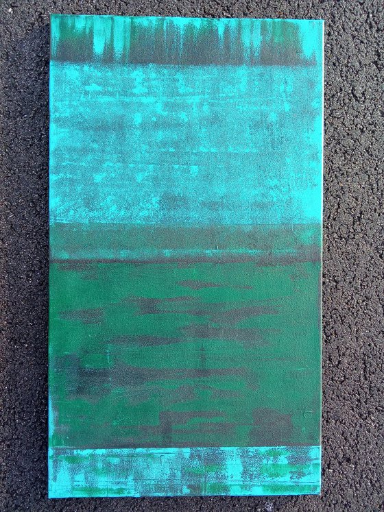 A warm dark green scarf