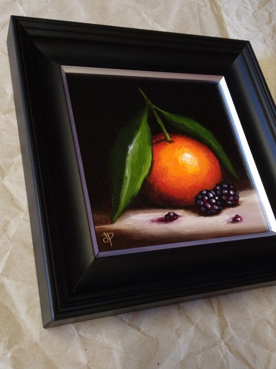 Clementine with berries still life