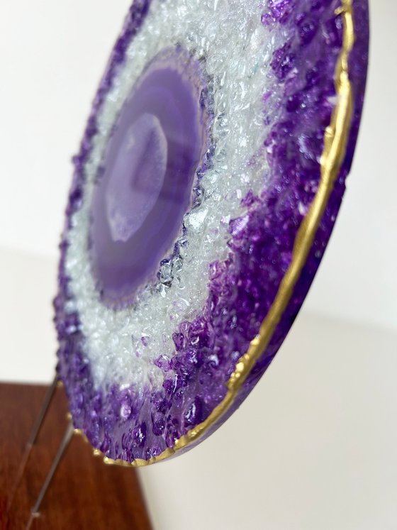 Amethyst framed in a glass circle