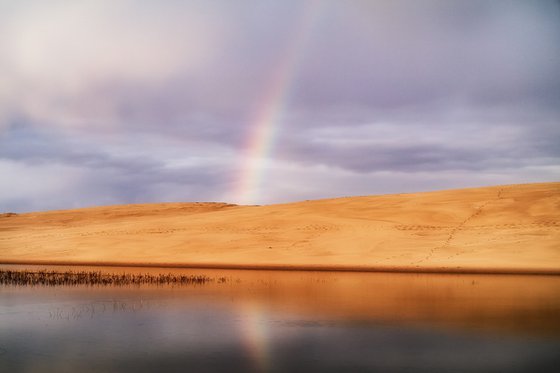 A rainbow over the dune