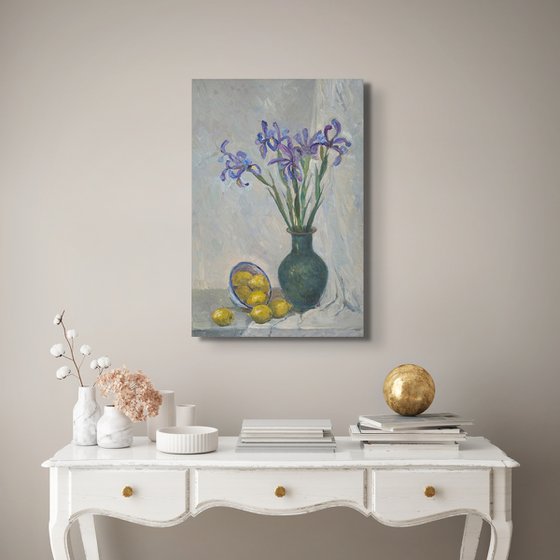 Still life with irises flowers and lemons