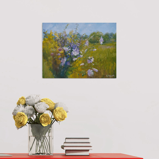 Flowers against a landscape