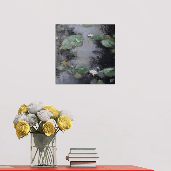 Whisper of white water lilies.