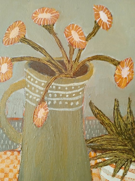 Green Jug... Orange Flowers