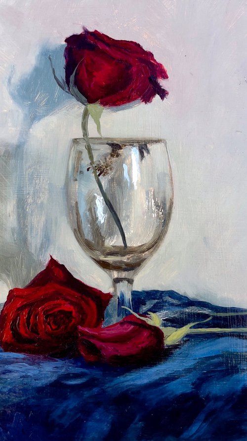 Red rose in empty glass by Mazen Ghurbal
