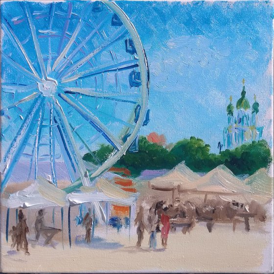 City square with a Ferris wheel and the city festival. Pleinair painting