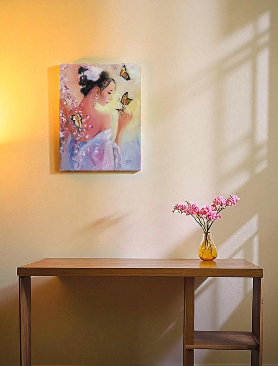 Portrait of a woman playing with Butterflies