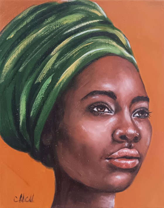 African woman with green scarf